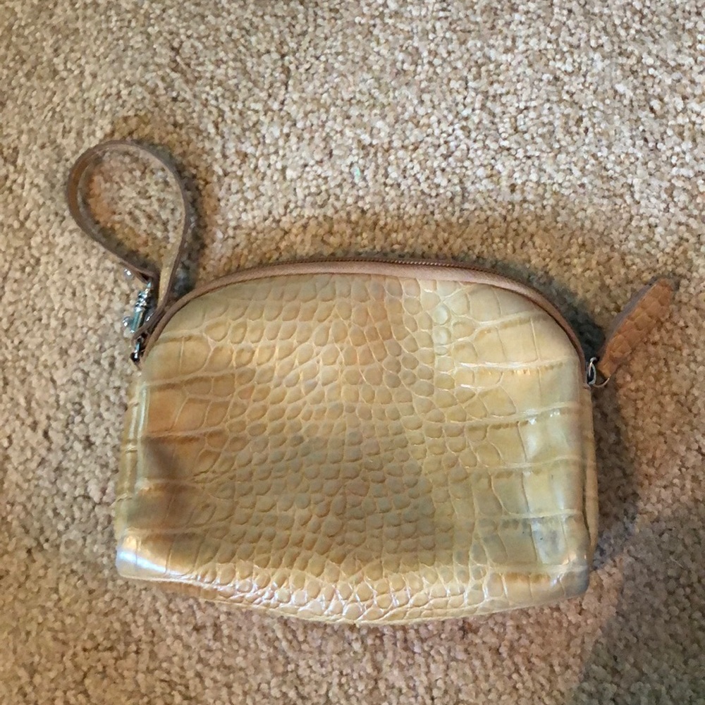Snakeskin print wristlet